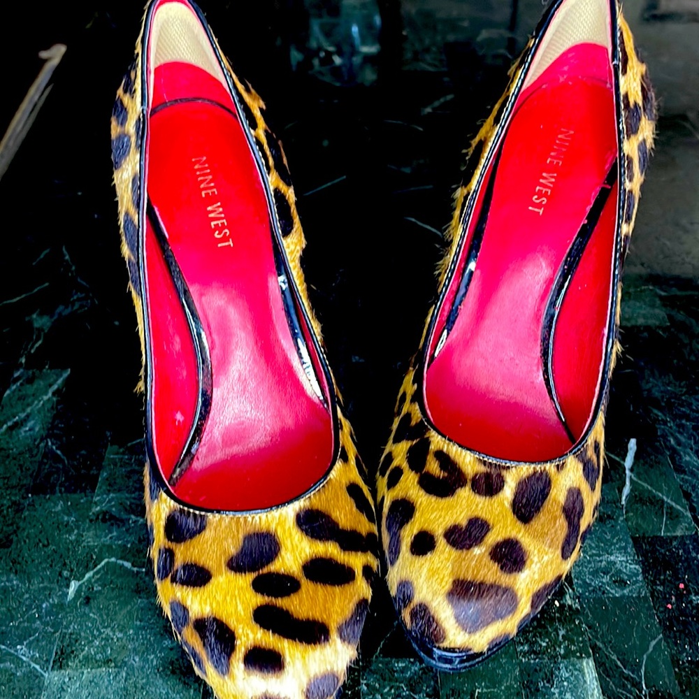 Cafe hair animal print heels. Not in new condition but gently used.